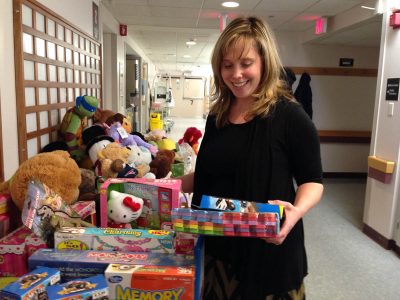 Marie Bagdis of Burlington chooses a gift  for her son Dominic.  