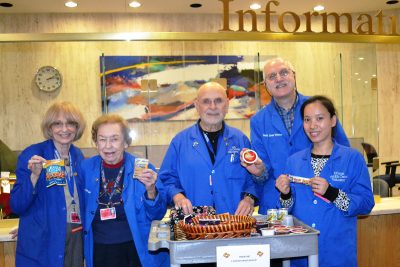 From left, UConn Health volunteers Nanette Levin, Mary Anne Everett, Bill Katz, George Ziewacz, and Emily Chan. 