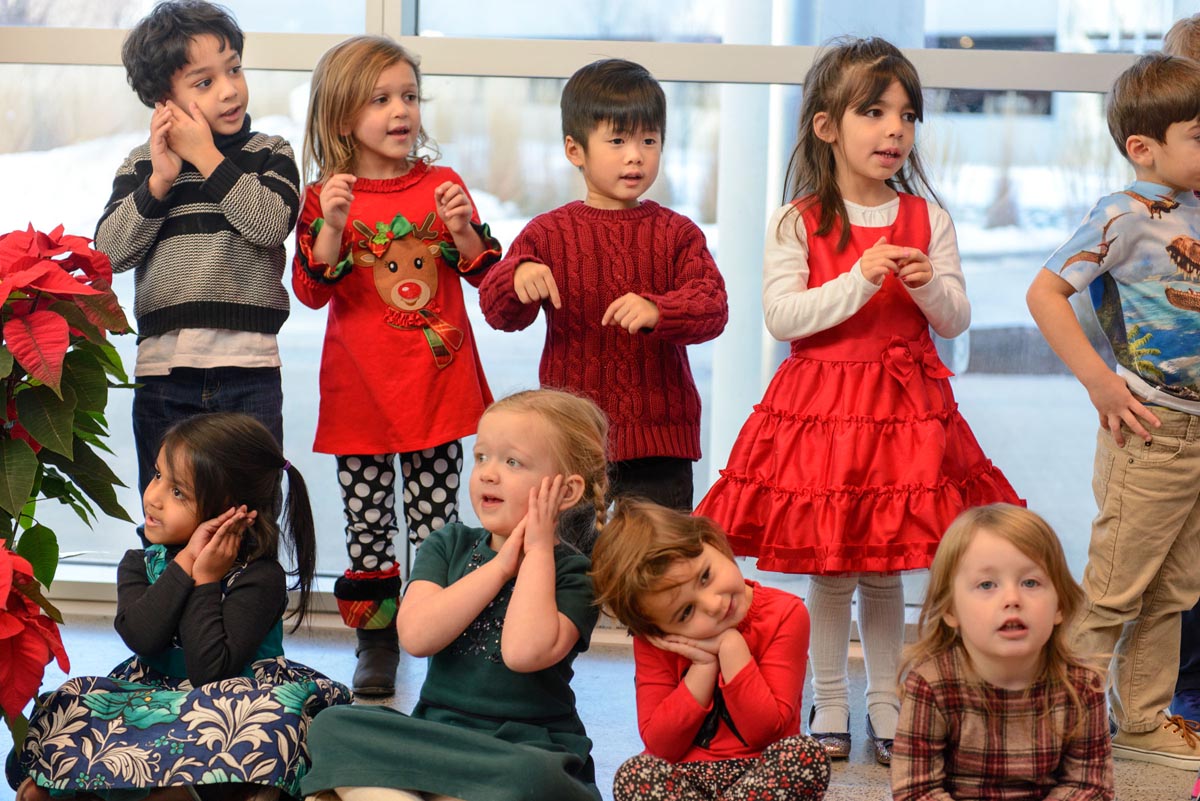 Preschoolers from the Child Care Center perform their holiday concert in the Outpatient Pavilion (Janine Gelineau/UConn Health)