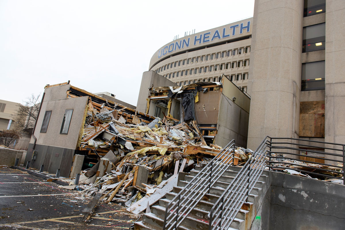Building 20, constructed in 1990 for extra office space at UConn Health, in the process of being demolished. (Photo by Janine Gelineau)